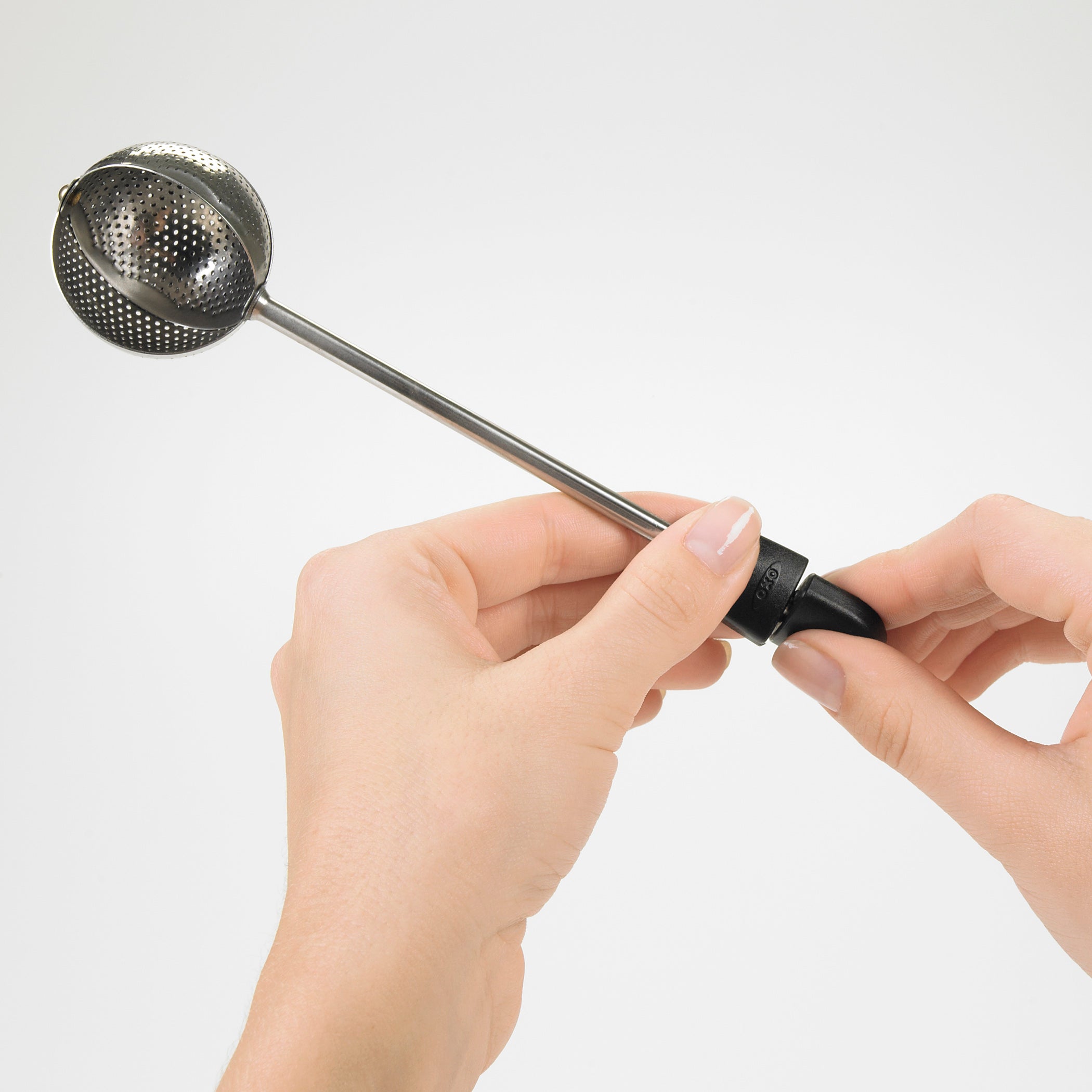 Twisting Tea Ball
